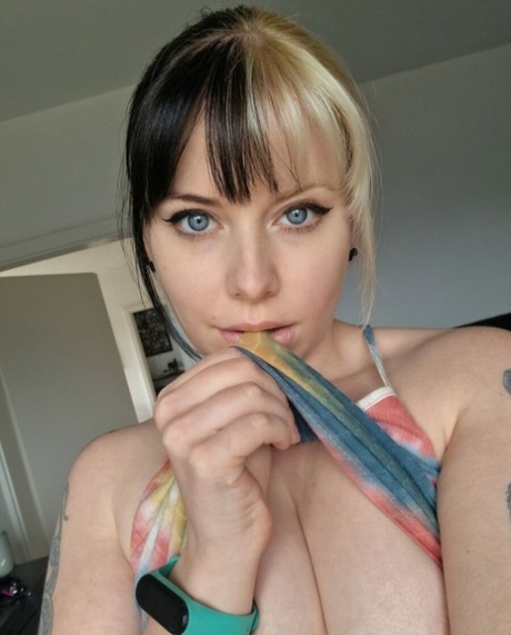 Amateur beauty Kirajameson makes silly faces while posing on camera