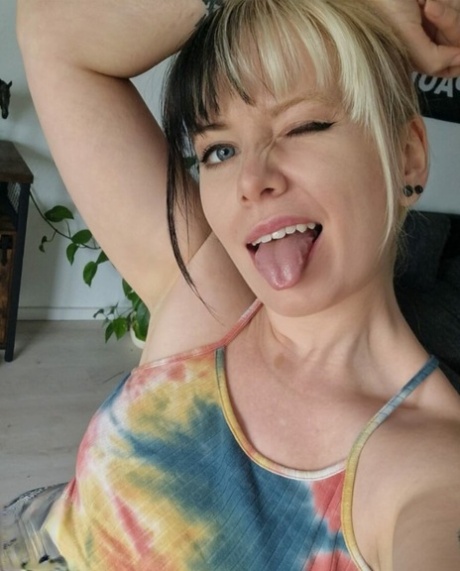 Amateur beauty Kirajameson makes silly faces while posing on camera