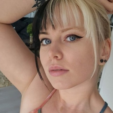 Amateur beauty Kirajameson makes silly faces while posing on camera