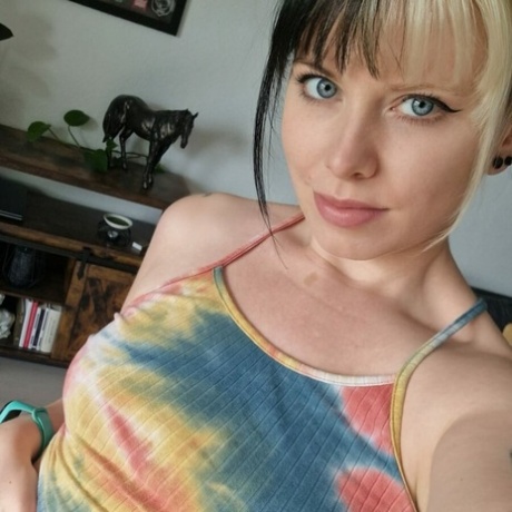 Amateur beauty Kirajameson makes silly faces while posing on camera
