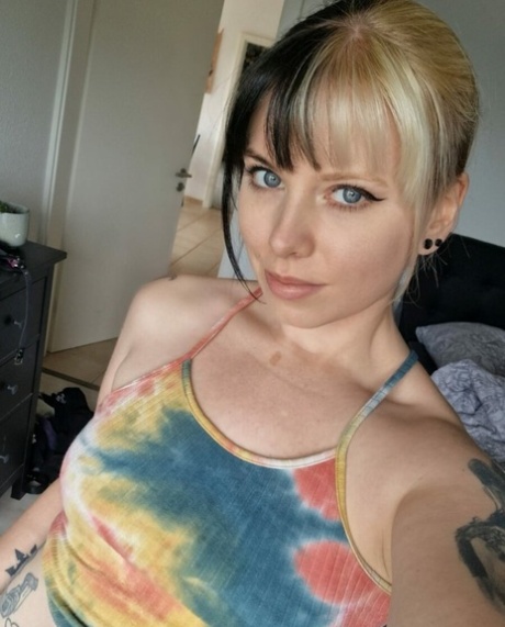 Amateur beauty Kirajameson makes silly faces while posing on camera