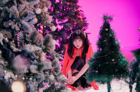 Asian girl Yuli teases in sexy lingerie & fools around with her BF on Xmas