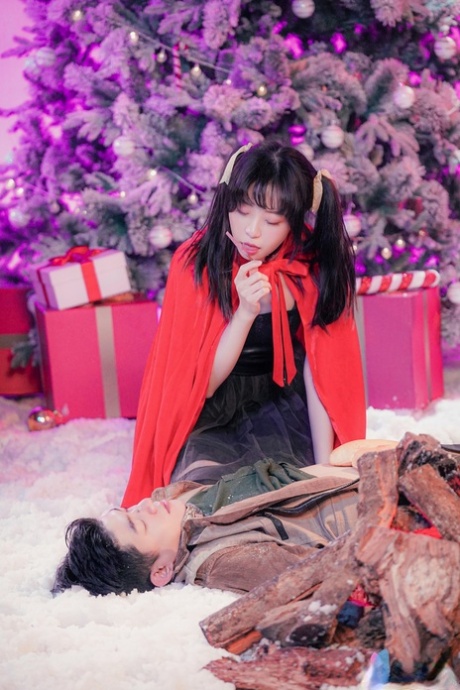 Asian girl Yuli teases in sexy lingerie & fools around with her BF on Xmas
