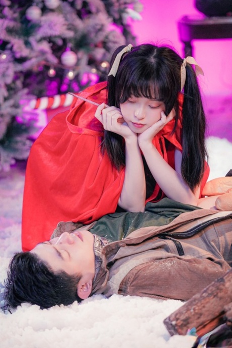 Asian girl Yuli teases in sexy lingerie & fools around with her BF on Xmas