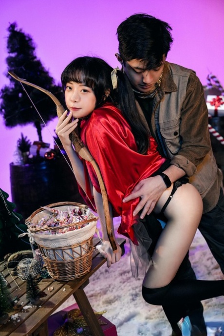 Asian girl Yuli teases in sexy lingerie & fools around with her BF on Xmas
