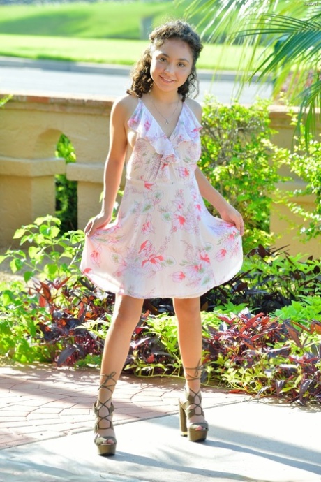 Glamorous teen Isabel showing off her flawless naked body outdoors
