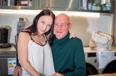 Brunette teen Bella Angel sucking and deepthroating a grandpa's old penis