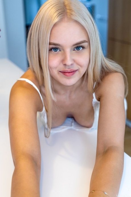 Adorable blue eyed teen Decima exposes her titties and hot ass in a solo