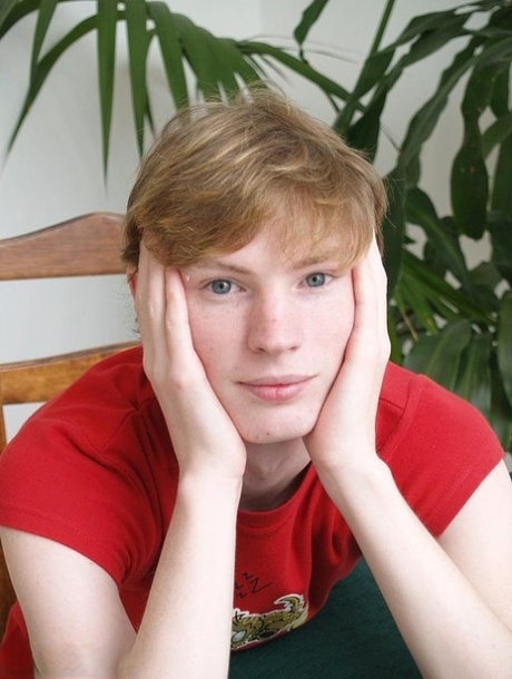 Blue eyed ginger twink Jackson C strips naked and jerks off his boner