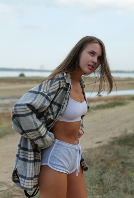 Beautiful amateur Olya Derkach shows her hot legs & her perfect booty outdoors