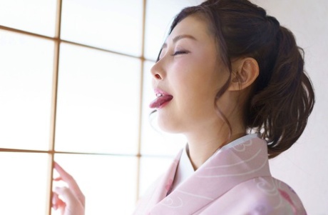 Beautiful Asian MILF Mirei Imada tastes a dick and male ass before sex