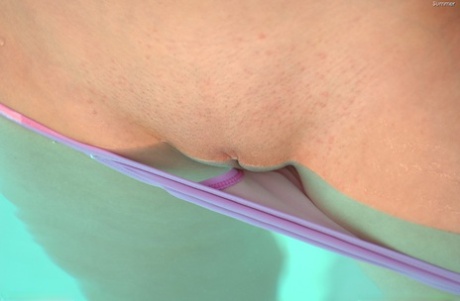 Sweet blonde babe with small boobs Summer shows her twat and poses