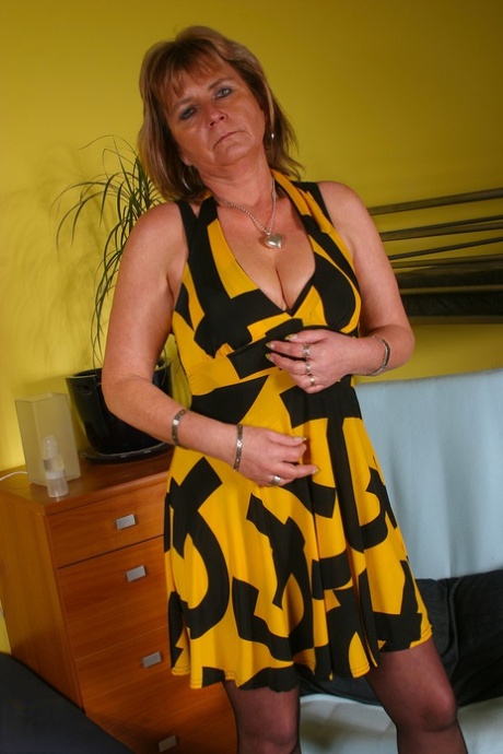Mature housewife Jana K spreads and fingers her horny pussy up close