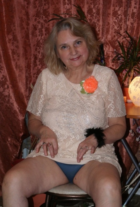 Amateur granny Helga strips naked & shows her huge saggy tits & hairy holes