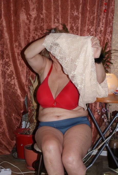 Amateur granny Helga strips naked & shows her huge saggy tits & hairy holes