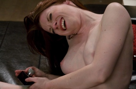 Sexy brunette MILF Amber Keen welcomes a machine dildo into her coochie