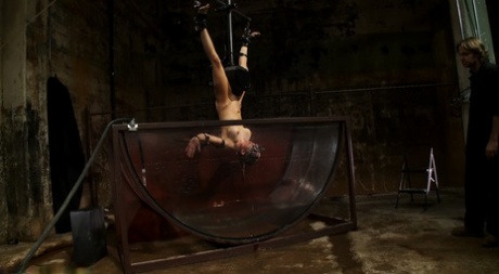 Blonde Rain DeGrey gets fucked by a machine dildo in underwater BDSM action