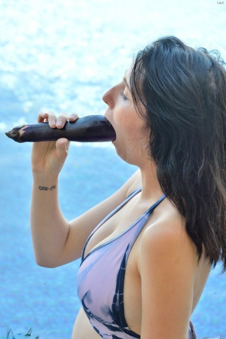 Amateur girlfriend with huge tits Lexi sticks an eggplant in her asshole