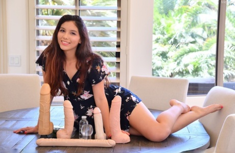 Cute brunette Melody exposes her twat & sticks several toys and her fist in it